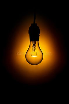 an illuminated light bulb on a dark background royalty images and stock photos - freeimages com