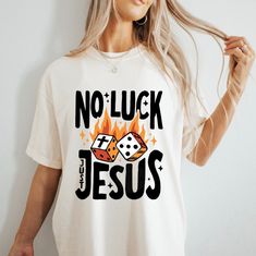 "No Luck Just Jesus" design on cream colored T-shirt. Brand: Comfort Color T-Shirt Color: Ivory T-shirt >> If you would like to customize on a different color/style garment, please message me and we can create together :) Size up one or two sizes for an oversized fit.  --- --- --- --- --- --- --- --- --- --- --- WASHING INSTRUCTIONS --- --- --- --- --- --- --- --- --- --- --- For best results, wash on cold/delicate cycle, hang dry, do not iron directly onto design, do not dry clean. No fabric softener. SHOP ANNOUNCEMENTS --- --- --- --- --- --- --- --- --- --- I regularly update my turnaround timeframe. These timeframes can be found in the "Shop Announcement" section. However, please keep in mind once the packages are dropped at USPS, delivery time is out of my hands. I appreciate your und Pre-shrunk Cream Graphic Tee, White Letter Print T-shirt As Gift, White Graphic Print Shirt For Gift, White Graphic Print Shirt As Gift, White Letter Print T-shirt As A Gift, White Text Print T-shirt As Gift, White Letter Print Shirt As A Gift, White Letter Print Shirt As Gift, Jesus Graphic