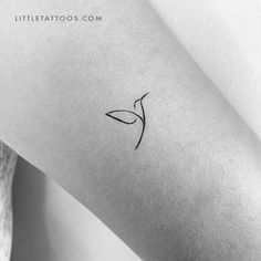 a black and white photo of a bird tattoo on the left arm, it looks like a single line drawing