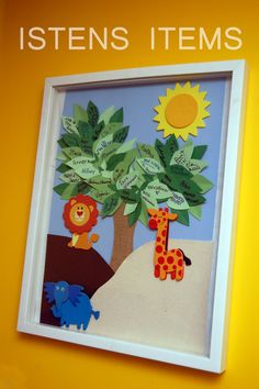 the children's artwork is displayed on the wall