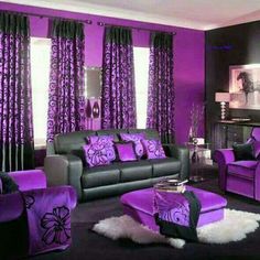 purple and black living room with two couches