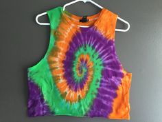 100% cotton crop top tank top with an unique tie dye pattern (pattern and color is exactly as pictured). Pre-shrunk and safe to wash with other clothes.  We would be happy to answer any questions. 0157 Unique Tie Dye, Tie Dye Pattern, Cotton Crop Top, Unique Ties, Top Tank, Tie Dye Patterns, Cropped Tank Top, Tie Dye Top, Womens Tank