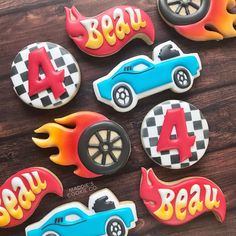 decorated cookies with hot wheels and cars on them for birthdays or baby's first birthday