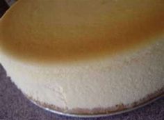 a piece of cheesecake sitting on top of a pan