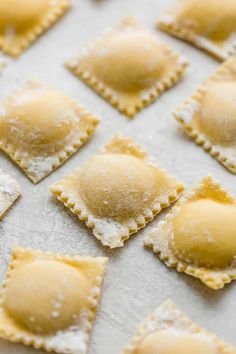 small ravioli shells covered in powdered sugar