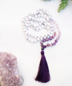 "- Gift For Her Jewelry Yoga Stack Boho Handmade Jewelry Rose Quartz Amethyst Howlite Mala Beads Mala Necklace Tassel Yoga Gift - FREE SHIPPING This listing is for ONE mala necklace. Each necklace is created by hand, and is available in a hand-knotted or non-knotted version. These necklaces can also be used as wrapped bracelets. This mala is available in both 6mm and 8mm beads, and is either knotted with a beautiful purple cord with matching nylon tassel, or on durable stretch cord for the non-k Hand-strung Purple Bohemian Beads, Purple Hand-strung Bohemian Beads, Bohemian Hand-strung Purple Beads, Purple Bohemian Hand-strung Beads, Bohemian Lavender Crystal Necklaces With Natural Stones, Lavender Round Beads Spiritual Necklace, Bohemian Amethyst Beaded Necklaces With Round Beads, Spiritual Amethyst Necklace With 108 Beads, Amethyst Necklace With 8mm Beads For Meditation