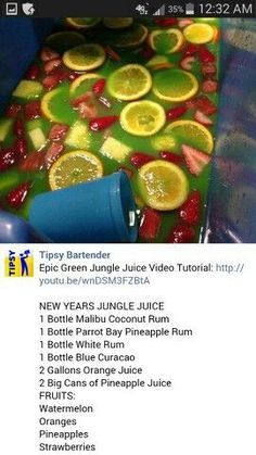 a bunch of lemons and orange slices in a tub full of water with the words tippy bartender on it