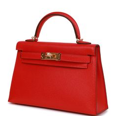 This Kelly, in the Sellier style, is in Rouge de Coeur chevre leather with gold hardware and has tonal stitching, two straps with front toggle closure, single rolled handle and removable shoulder strap.The interior is lined with Rouge de Coeur lambskin leather and has one open pocket on the back wall. Collection: UOrigin: FranceCondition: Pristine; new or never (plastic on hardware)Accompanied by: Hermes box, Hermes dustbag, shoulder strap, shoulder strap dustbag, felt, carebookMeasurements: 7.5 Hermes Kelly Sellier, Kelly 32, Kelly Sellier, Hermes Box, Hermes Bags, Lambskin Leather, Gold Hardware, Dust Bag, Fendi