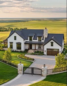 an aerial view of a large home in the country