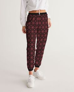 Our Women's Track Pants are both lightweight and versatile.Its water-resistant fabric keeps you dry and comfortable so you can get active with ease and its relaxed fit makes it great street-worthy style. Lightweight, water-resistant fabric - Zip pockets - Elastic waistband and cuffs - Fully lined, mesh lining - Printed, cut, and handmade. Get Active, Water Resistant Fabric