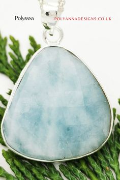 The heavenly blue and green statement teardrop gemstone found within simple, classy sterling silver setting adds an eccentric aura to the design. The minimalist silver which surrounds the genuine aquamarine beautifully emphasises the cool tones of the large teardrop silver setting.