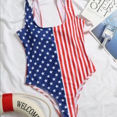 It Is A Nice Suit! Fits M-L Fitted Blue Swimwear With Flag Print, Patriotic Blue Swimwear With American Flag Print, Blue Patriotic Swimwear With American Flag Print, Patriotic Blue Swimwear For Summer, Patriotic Blue American Flag Print Swimwear, 4th Of July Blue Swimwear With American Flag Print, Blue Flag Print Swimwear For 4th Of July, 4th Of July Blue Summer Swimwear, Blue Summer Swimwear For 4th Of July