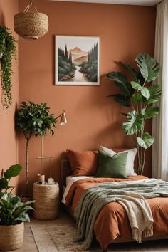 a bedroom with orange walls and plants in the corner