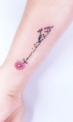 a woman's foot with a tattoo that says love and flowers on the side