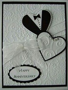 an anniversary card with two hearts on it