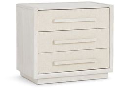 a white nightstand with three drawers on each side