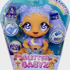 the littlest baby doll has purple hair and blue eyes