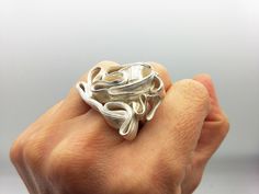 Unique  and quite big handmade ring using an ancient Japanese technique called Mitsuro Hikime. This technique is nearly on its way to extinction. This method requires a calm mindset, resilience to failure and an open mind to accidental and unique outcomes. Each piece is one of a kind and impossible to replicate. I am one of the few jewelry artists in the world keeping this beautiful technique alive. This ring in the picture is size 54. For other sizes I can make a similar one for you. Do you pre Unique Hand Cast Sterling Silver Wide Band Ring, Mitsuro Hikime Jewelry, Mitsuro Hikime, Calm Mindset, Sculptural Ring, Japanese Jewelry, Hollow Form, Statement Ring Silver, Unique Ring