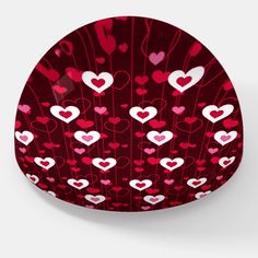 a red plate with hearts on it