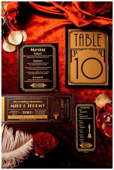 the table is set up with menus, place cards, and other items for an event