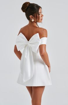 This oh-so-romantic, yet modern style is top of our wishlists. Make a statement in Delta, designed with a contrast bardot neckline that shows off your shoulders, and adorned with a dreamy bow detail to the back. In a playful mini length, the look is complete with a rounded, bubble shape skirt. 



Colour: Ivory.

Premium non-stretch crepe.

Fully lined.

Contrast bardot neckline.

Bow detail to back.

Rounded, bubble shape skirt.

Invisible zipper fastening.

Mini length.

 Size: XS, S, M, L, XL, XXL Bridal Romper, Short White Dress Wedding, Split Long Dress, Bardot Neckline, Cute Birthday Outfits, Loungewear Dresses, Maxi Dress Sale, Bubble Skirt, Maxi Dress Navy