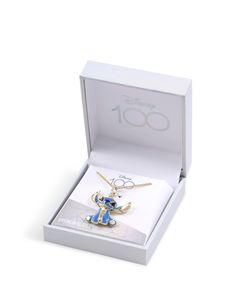 This Official Disney sterling silver Lilo and Stitch pendant necklace is the perfect gift for any Disney fan! Featuring a sterling silver double chain necklace with a blue and gold pendant of Stitch himself. Supplied in official Disney packaging. Stitch Necklace, Christmas Offers, Double Chain Necklace, Gold And Blue, Disney Fan, Double Chain, Tech Gifts, Blue And Gold, Lilo And Stitch