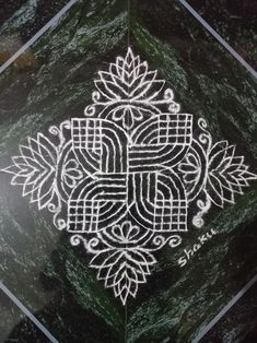 an intricate design is shown on the floor