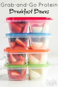 four plastic containers filled with strawberries and yogurt are stacked on top of each other