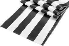 black and white striped paper napkins stacked on top of each other