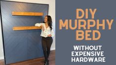 a woman standing in front of a bed with wooden boards on the wall and text that reads diy murphy bed without expensive hardware hardware hardware