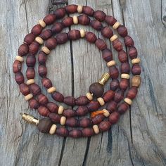 📿Mala made with Tulsi Beads in deep brown colour complimeted with rondelle white tulsi beads. Brown Tulsi Mala is believed to be fine for the skin, improving circulation & strengthening an individual's feeling while repelling the harmful energy. 📿 🚪 NECKLACE DETAILS 🚪 📏Mala Beads size: 6.5 mm (Cylindrical) x 5.5 mm (Round) (Approx) 📏Mala Necklace Length: 19.0 inches 📏One Round 🚪 Pure Tulsi Beads Sourced from Vrindavan 📿 TULSI BEADS PROPERTIES 📿 🌹 Enormous physical healing powers 🌹 Re Brown Beaded Necklace With 108 Beads For Festivals, Brown Spiritual Beads For Meditation, Spiritual Brown Beaded Bracelets, Brown Hand-strung Jewelry For Meditation, Handmade Brown Beaded Bracelets For Ceremonial Use, Handmade Brown Beaded Bracelets For Rituals, Brown Beaded Bracelets With 8mm Beads For Meditation, Brown Beaded Necklace For Festivals, Traditional Brown Beaded Necklace Hand-strung