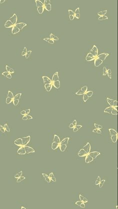 yellow butterflies are flying in the air on a green background with white and black lines