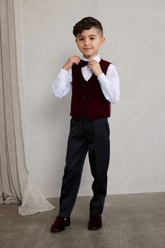 Tie Town takes the tie game to the next level with our drip and dapper tuxedo sets!  Tie Town Boy's Shawl Lapel Velvet Tuxedo is 4-pieces:  Vest, Pants, Dress Shirt, and matching Bow Tie!  This drip and dapper tuxedo set is an exquisite poly-rayon blend. Tuxedos are slim fit, so make room for allowances!  Wear for weddings, formal events, and the daily dapper!  Care instructions: Dry Clean Only Fitted Sleeveless Vest With Ties, Classic Fitted Vest With Ties, Formal Tuxedo Style Vest, Formal Tuxedo Style Sleeveless Vest, Sleeveless Tuxedo Suit For Party, Sleeveless Tuxedo Vest For Formal Events, Fitted Sleeveless Tuxedo Set, Victorian Children's Clothing, Vest And Bow Tie