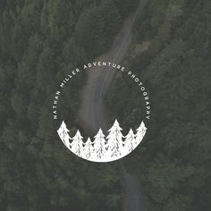 an aerial view of a road surrounded by trees with the words, what's your wild adventure photography?