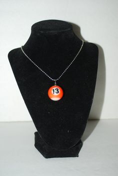 These pool ball necklaces come in different length and style chains for men or women and are available in all the numbers of a regular pool ball set. The numbers 1 thru 8 are solid color and the 9 thru 15 are striped ( just like regular pool balls ). The ball chain is meant for men or women and can be cut to a shorter length if need. The flat link chain ( not shown ) is a little bit fancier and will appeal to the ladies. Each ball is about the size of a US quarter ( 1 inch ). Right now we have a Pool Ball, Cute Piercings, Ball Necklace, Weird Fashion, Chains For Men, Ball Chain, Jewelry Inspo, Body Jewelry, Necklace Etsy