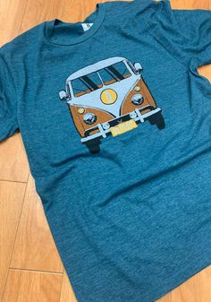 Detroit Teal VW Van Short Sleeve T Shirt - 5718150 Outdoor Cotton Crew T-shirt, Casual Tops With Front Print For Outdoor Activities, Outdoor Crew-neck Cotton T-shirt, Casual Crew Top With Front Print, Cotton Crew Neck T-shirt For Outdoor, Casual Crew Neck Top With Front Print, Outdoor Crew T-shirt With Graphic Print, Outdoor Graphic Print Crew T-shirt, Outdoor Crew Neck T-shirt With Graphic Print