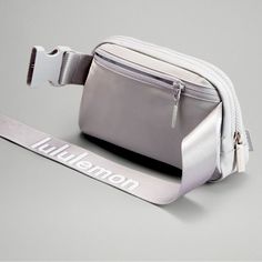 Phone, Keys, Wallet. Keep Them Close In This Versatile Belt Bag That Helps You Get Out The Door And On To Your Next Adventure. Water Resistant. Color: Silver Drop, White Lululemon Logo On Strap. Sold Out And Hard To Find. Brand New With Tag. No Trade Pls. Bundle To Save More! Lululemon Everywhere Logo Strap Belt Bag Lululemon Belt Bag Silver Drop, White Everywhere Belt Bag Lululemon, Lululemon Bags, Drop Logo, Lululemon Everywhere Belt Bag, Everywhere Belt Bag, Pink Wristlet, Running Belt, Bag Silver