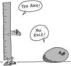 a cartoon drawing of a ruler and a rock