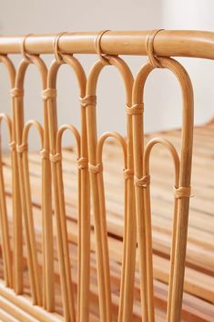 a close up of a bamboo bed frame