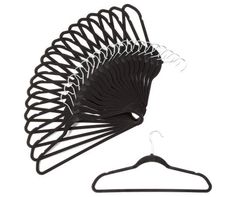 a set of black hangers on a white background