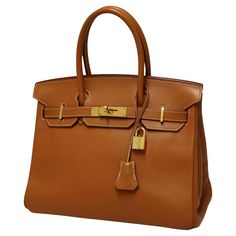 rare ! Hermès Birkin bag 30 in Barénia leather from 1999. Will be delivered in its dustbag and original Hermès box Condition : very good Made in France Collection : Birkin 30 Gender: woman Material: Barenia smooth calfskin leather Lining: smooth leather Color : gold Measurements : 30 x 21 x 16 cm Stamp : C in a square Year : 1999 Hardware : gold finish metal Details : vintage bag in very good condition, no sign of corner wear. Includes zipper, clochette, key (x2) and padlock. Barénia leather is soft and smooth to the touch, yet highly resistant and durable. Epsom Leather Travel Bag With Hasp Closure, Designer Brown Bag With Hasp Closure, Epsom Leather Bags With Lock For Everyday Use, Gold Epsom Leather Bag With Lock, Brown Office Shoulder Bag With Lock, Classic Brown Bag With Lock, Brown Business Bag With Lock, Brown Business Bags With Lock, Classic Office Bag With Lock