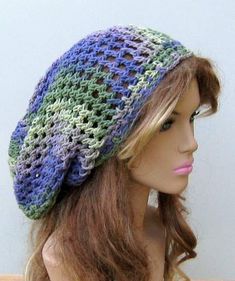 a mannequin head wearing a crocheted hat