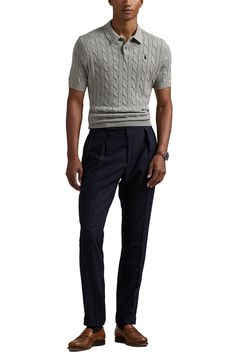 Classic cabling brings old-school details to a polo-style sweater that's knit from breathable cotton and styled to elevate any warm-weather look. 26" length (size Medium) Button half placket Spread collar Short sleeves Ribbed cuffs and hem 100% cotton Dry clean or hand wash, dry flat Imported Fitted Navy Polo Sweater With Ribbed Collar, Casual Wool Sweater With Polo Collar, Fitted Knit Polo Sweater With Polo Collar, Classic Navy Fitted Polo Sweater, Casual Wool Polo Shirt For Work, Fitted Casual Sweater With Polo Collar, Classic Cable Knit Polo Sweater, Classic Fitted Knit Sweater, Classic Fitted Polo Shirt For Winter