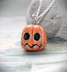 A handmade clay bead pumpkin/Helloween from a wonderful artist and I made it into a necklace pendant with a sterling silver chain. The chain is closed with a carabiner clasp. Chain length approx. 50 cm long. Pearl size approx. 17 mm Depending on your monitor settings, the color may differ slightly from the original. Pearl Pumpkin, Bead Pumpkin, Polymer Clay Pendants, Clay Pendants, Clay Bead, Polymer Clay Pendant, Handmade Clay, Clay Ideas, Pearl Size