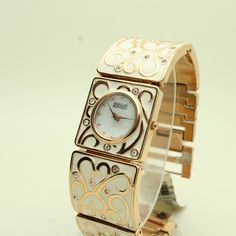 Ba- 1234bkbb Timeless Piece. (No Pun Intended) Extremely Hard To Find. White And Rose Gold, Swarovski Crystals New Battery. Diamonds In Band. Enamel Cuff. Wrist Extension And Box Included. Elegant Rose Gold Diamond Watch For Party, Elegant White Diamond Watch For Evenings, Elegant White Diamond Watch For Evening, Elegant White Watches With Metal Dial, Elegant White Diamond Watch With Round Dial, White Metal Watch As Gift, White Metal Watch For Gift, Elegant White Diamond Watch For Wedding, White Diamond Watch With Metal Dial For Gift