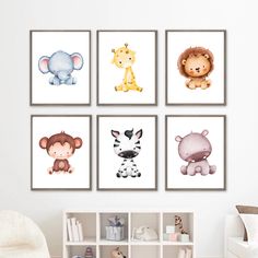 four children's wall art prints with animals and giraffes on them