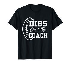 a black t - shirt that says dibs on the coach with an image of a football