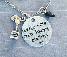 a necklace that says write your own happy endings