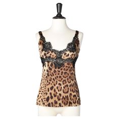 Silk leopard tank top with lace. SIZE 40 (It) S Elegant Sleeveless Leopard Print Tops, Fitted Leopard Print Cami Tank Top, Fitted Leopard Print Camisole With Spaghetti Straps, Fitted Leopard Print Camisole, Leopard Print Sleeveless Top With Built-in Bra, Sleeveless Leopard Print Top With Built-in Bra, Chic Leopard Print Sleeveless Top, Stretch Leopard Print Tops With Built-in Bra, Chic Leopard Print Cami Top