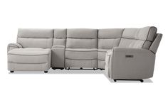 the reclining sectional sofa with power headrests and footstools is shown